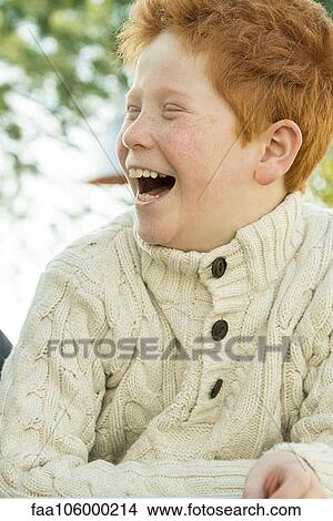 Father and son laughing together outdoors View Large Photo Image Picture - Father and son laughing together outdoors. Fotosearch