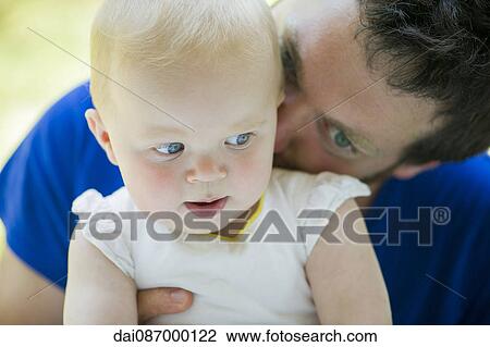 Father nuzzling baby View Large Photo Image Stock Image - Father nuzzling baby. Fotosearch
