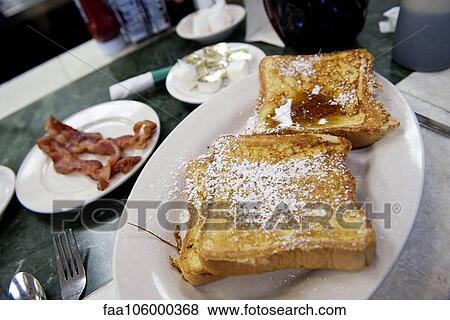 French toast and bacon on restaurant table View Large Photo Image Stock Photo - French toast and bacon on restaurant table. Fotosearch