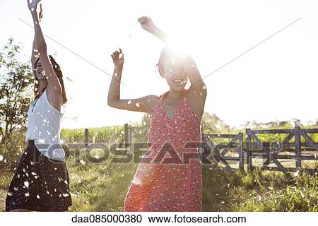 Friends dancing outdoors View Large Photo Image Stock Image - Friends dancing outdoors. Fotosearch