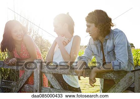 Friends spending weekend together outdoors View Large Photo Image Stock Image - Friends spending weekend together outdoors. Fotosearch