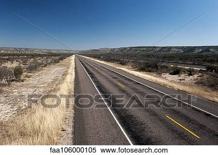 Highway through desert landscape View Large Photo Image Stock Photography - Highway through desert landscape. Fotosearch