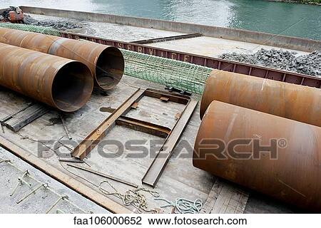 Large pipes at construction site View Large Photo Image Stock Image - Large pipes at construction site. Fotosearch