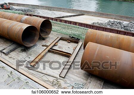 Large pipes at construction site View Large Photo Image Stock Image - Large pipes at construction site. Fotosearch