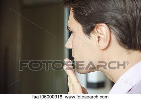 Man applying moisturizer to face View Large Photo Image Stock Photography - Man applying moisturizer to face. Fotosearch