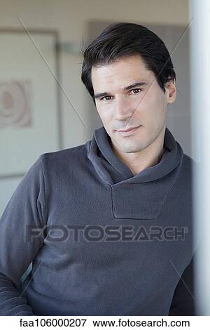Man leaning against wall, portrait View Large Photo Image Stock Photo - Man leaning against wall, portrait. Fotosearch