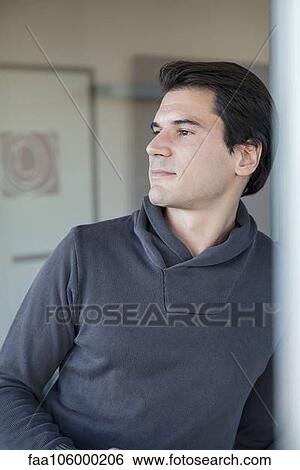 Man looking away in thought, portrait View Large Photo Image Stock Photograph - Man looking away in thought, portrait. Fotosearch