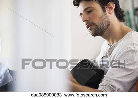Man playing acoustic guitar View Large Photo Image Stock Image - Man playing acoustic guitar. Fotosearch