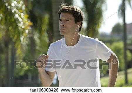 Man running in park View Large Photo Image Stock Photograph - Man running in park. Fotosearch