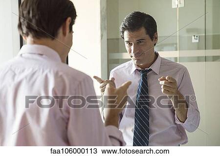 Man smiling at his reflection in mirror View Large Photo Image Stock Image - Man smiling at his reflection in mirror. Fotosearch
