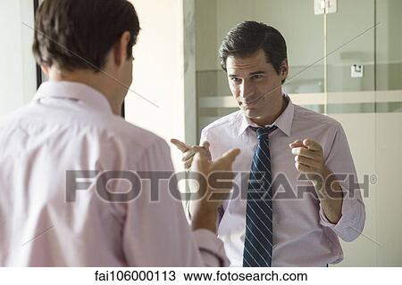 Man smiling at his reflection in mirror View Large Photo Image Stock Image - Man smiling at his reflection in mirror. Fotosearch