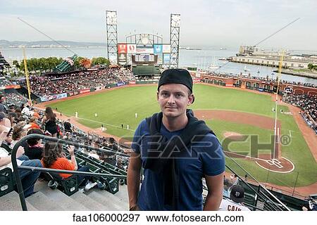 Man standing in baseball stadium in San Francisco, California, USA View Large Photo Image Stock Photo - Man standing in baseball stadium in San Francisco, California, USA. Fotosearch