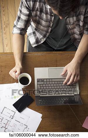 Man using laptop computer View Large Photo Image Picture - Man using laptop computer. Fotosearch