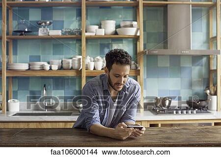 Man using smartphone View Large Photo Image Picture - Man using smartphone. Fotosearch