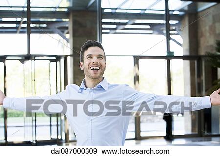 Man with arms outstretched View Large Photo Image Stock Photo - Man with arms outstretched. Fotosearch