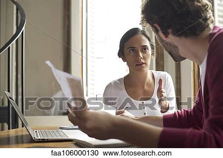 Managing household expenses can be challenging for young couples View Large Photo Image Stock Image - Managing household expenses can be challenging for young couples. Fotosearch