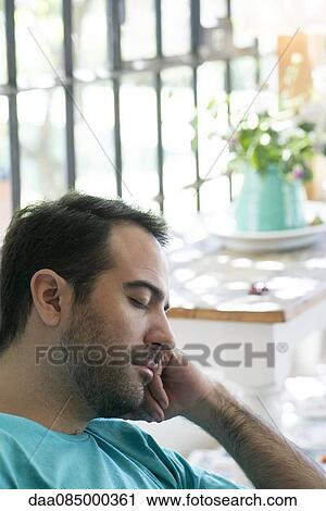 Mand taking nap View Large Photo Image Stock Image - Mand taking nap. Fotosearch
