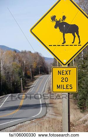 Moose crossing sign along highway View Large Photo Image Stock Image - Moose crossing sign along highway. Fotosearch