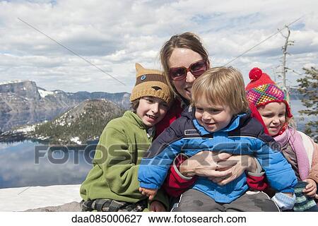 Stock Photo - Mother and children at Crater Lake National Park, Oregon, USA. Fotosearch
