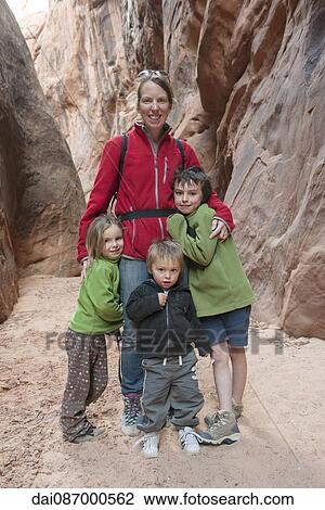 Mother and children hiking together, portrait View Large Photo Image Stock Image - Mother and children hiking together, portrait. Fotosearch