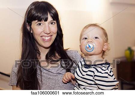 Mother and toddler, portrait View Large Photo Image Stock Image - Mother and toddler, portrait. Fotosearch