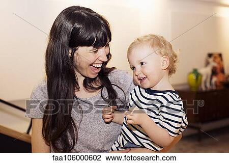 Mother and toddler, portrait View Large Photo Image Stock Image - Mother and toddler, portrait. Fotosearch