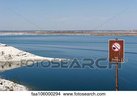 No fishing sign posted near water View Large Photo Image Picture - No fishing sign posted near water. Fotosearch
