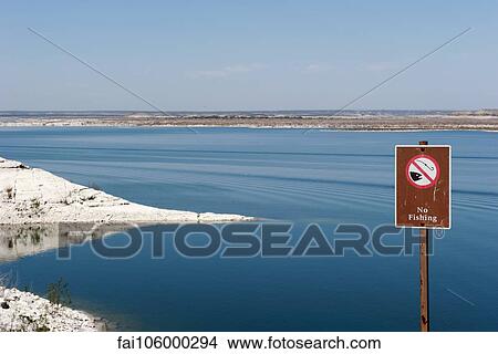 No fishing sign posted near water View Large Photo Image Picture - No fishing sign posted near water. Fotosearch