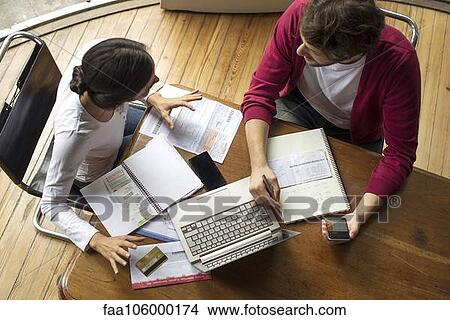 Online banking makes managing family finances easier than ever View Large Photo Image Picture - Online banking makes managing family finances easier than ever. Fotosearch