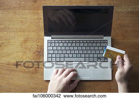 Stock Image - Online shopping with credit card. Fotosearch