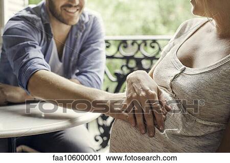 Parents excited about new addition to family View Large Photo Image Stock Image - Parents excited about new addition to family. Fotosearch