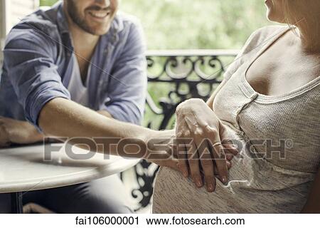 Parents excited about new addition to family View Large Photo Image Stock Image - Parents excited about new addition to family. Fotosearch