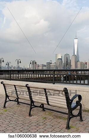 Park bench with scenic view of Lower Manhattan, New York City, New York, USA View Large Photo Image Stock Photo - Park bench with scenic view of Lower Manhattan, New York City, New York, USA. Fotosearch