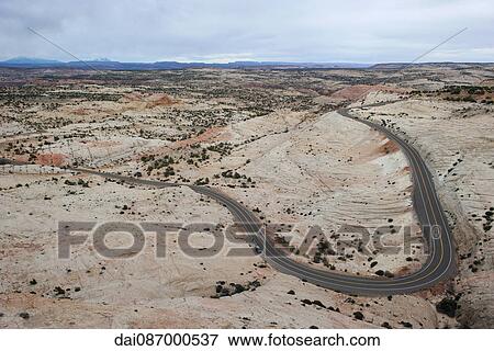 Paved road through desert landscape View Large Photo Image Stock Photo - Paved road through desert landscape. Fotosearch
