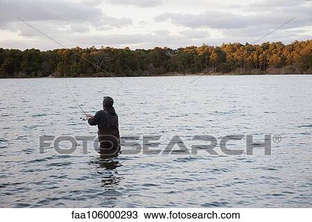 Person fishing in lake View Large Photo Image Stock Image - Person fishing in lake. Fotosearch