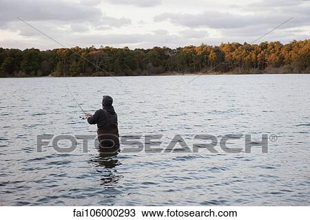 Person fishing in lake View Large Photo Image Stock Image - Person fishing in lake. Fotosearch
