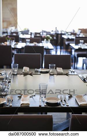 Place settings in modern dining room View Large Photo Image Stock Image - Place settings in modern dining room. Fotosearch