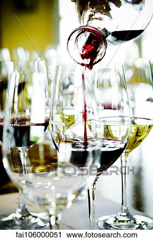 Pouring wine View Large Photo Image Stock Image - Pouring wine. Fotosearch