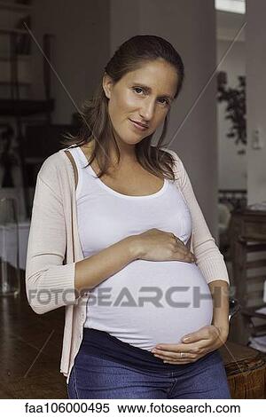 Stock Photography - Pregnant woman, portrait. Fotosearch