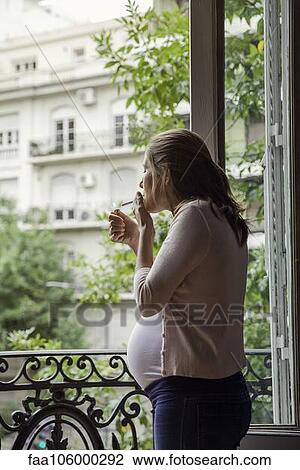 Pregnant woman smoking cigarette View Large Photo Image Stock Image - Pregnant woman smoking cigarette. Fotosearch