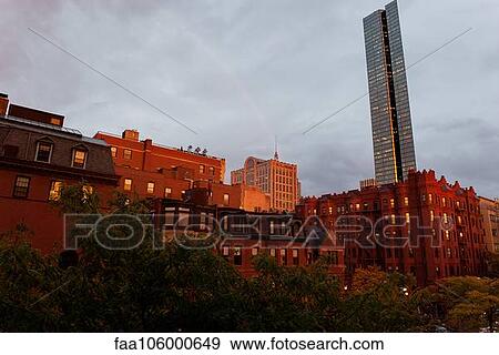Stock Photo - Rainbow over city, Boston, Massachesetts, USA. Fotosearch