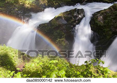 Rainbow over waterfall, Olympic National Park, Washington, USA View Large Photo Image Stock Image - Rainbow over waterfall, Olympic National Park, Washington, USA. Fotosearch