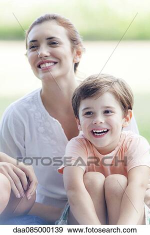 Relaxing in the park with family and friends View Large Photo Image Stock Photo - Relaxing in the park with family and friends. Fotosearch