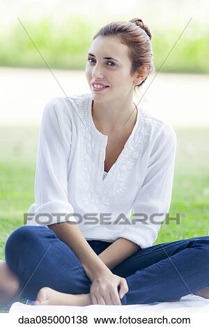 Relaxing in the park with friends View Large Photo Image Stock Photo - Relaxing in the park with friends. Fotosearch