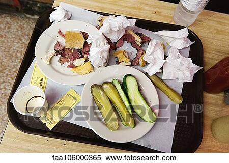 Remnants of deli sandwich on tray View Large Photo Image Stock Photography - Remnants of deli sandwich on tray. Fotosearch
