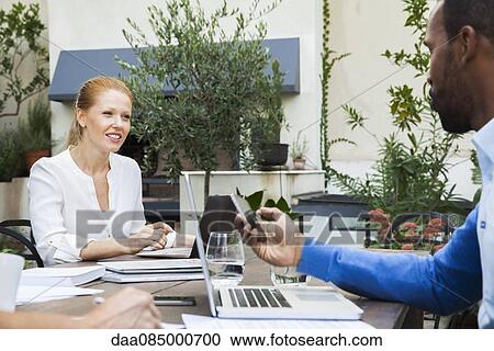 Remote business meeting by conference call View Large Photo Image Stock Image - Remote business meeting by conference call. Fotosearch