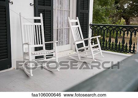 Rocking chairs on porch View Large Photo Image Stock Photograph - Rocking chairs on porch. Fotosearch