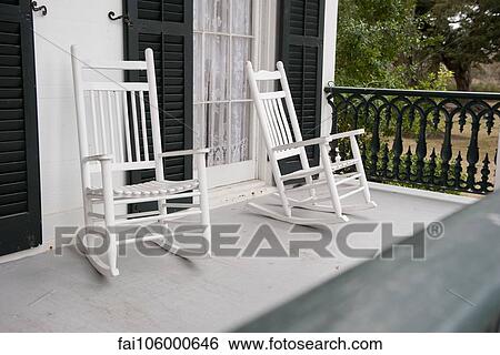 Rocking chairs on porch View Large Photo Image Stock Photograph - Rocking chairs on porch. Fotosearch