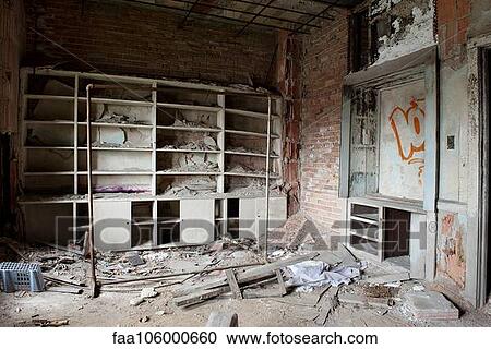 Rubble and graffiti in abandoned, deteriorating building View Large Photo Image Stock Image - Rubble and graffiti in abandoned, deteriorating building. Fotosearch