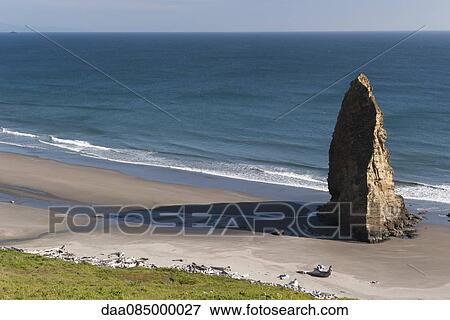 Stock Photo - Sea stack rock formation on beach at Cape Blanco State Park, Oregon, USA. Fotosearch